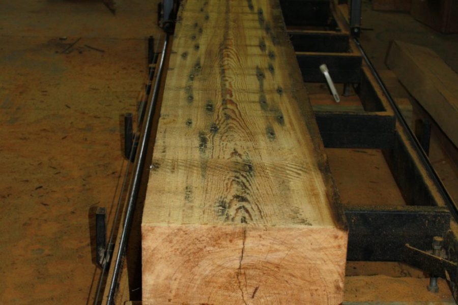 Heart Pine Beams Ready to be Reclaimed