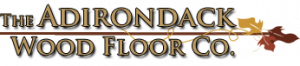 The Adirondack Wood Floor Co in gold surrounded by leaves